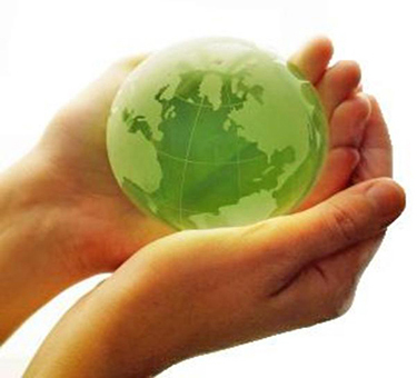 Hands Holding Green Earth